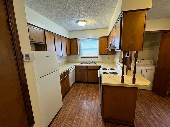Kitchen and laundry closet.