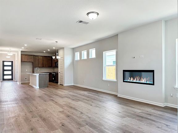 The Oakshire II- Family Room with Electric Fireplace.