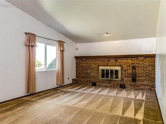 Airy vaulted ceilings in family room