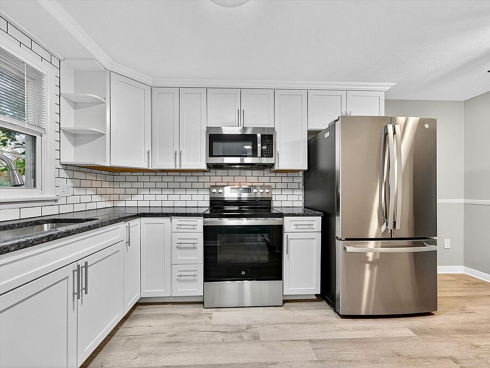 Brand new cabinets, granite counters, new appliances, and new floors