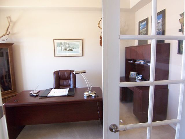 Handsome main level office w/ French door entry
