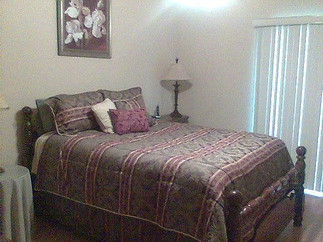 Large bedroom with bathroom attached. 