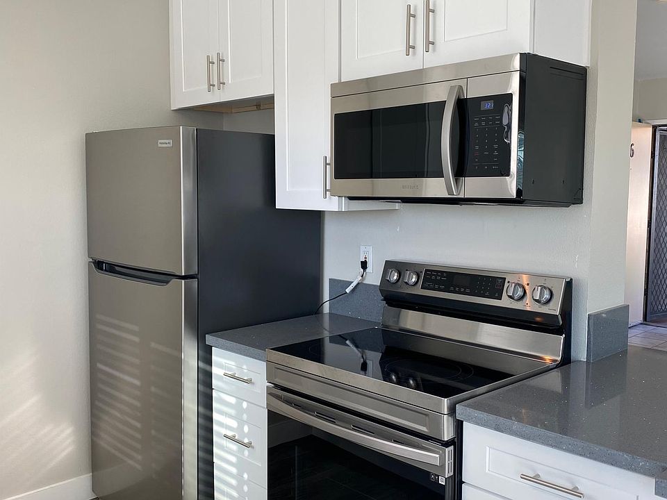 Brand new fridge, oven, microwave, and dishwasher