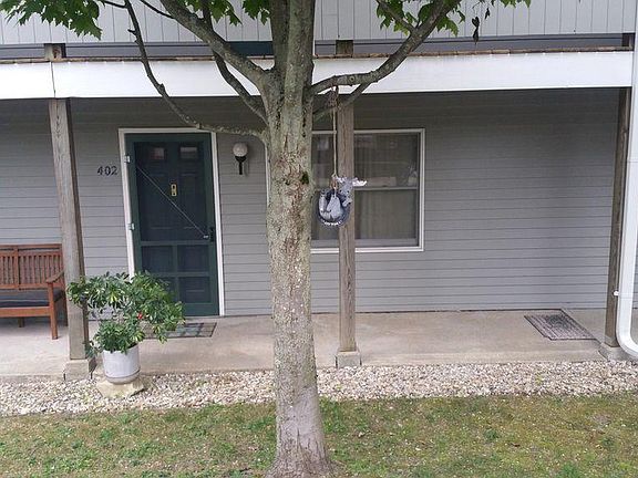 Front door, with car parking in front