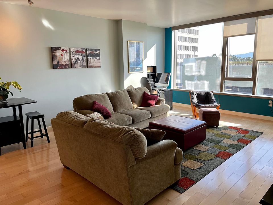 Large living room with full wall windows