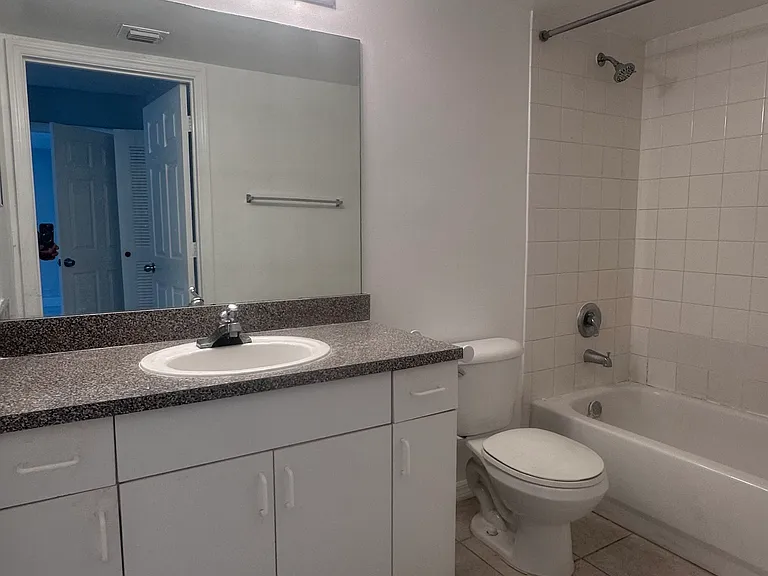 5011 Wiles Rd #207 — Photo 33