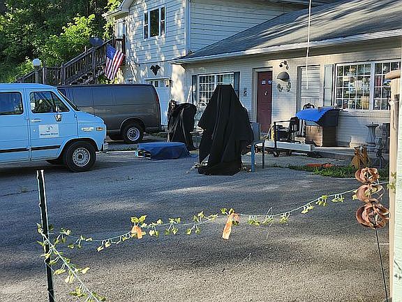 Asphalt parking area.