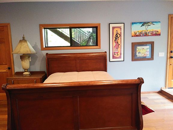 Queen size sleigh bed with dresser.