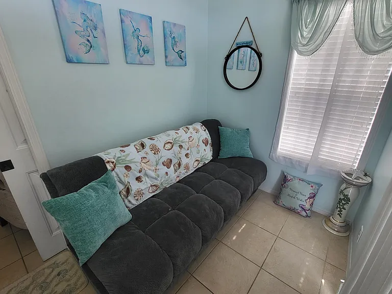Futon for guest or small child - easy folder down - Storage underneath, where bedding is stored