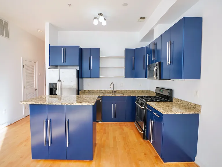 Modern open layout kitchen with dining area