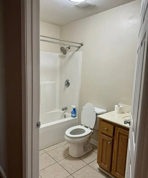 Hall bathroom situated between two front bedrooms