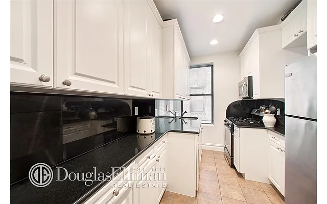 Sold by Douglas Elliman | media 11