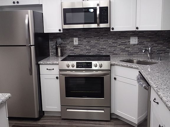 New wood cabinets, granite counters