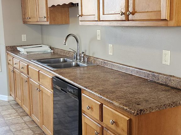 Kitchen cabinets with sink and disposal