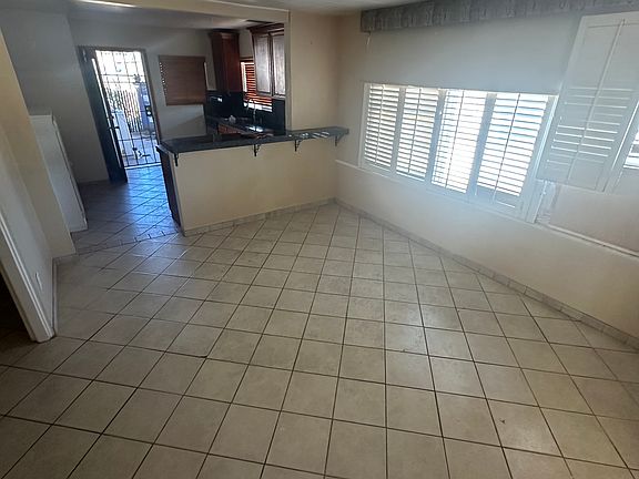 Dining Room looking into kitchen and towards the backyard