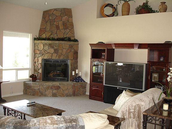 Snuggle up to this Lodge like fire place!