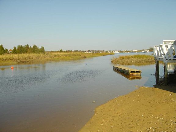 From porch looking northeast towards harbor at low tide