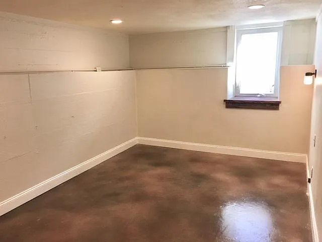 Bedroom 1/ LED lighting/ egress window. Now with wood look vinyl plank flooring not shown in pics.