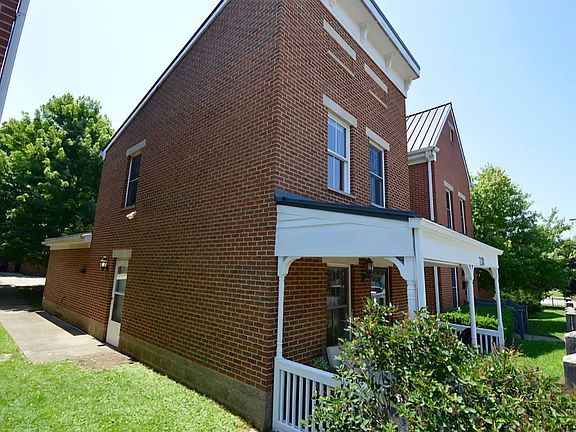 Side of house including side entrance