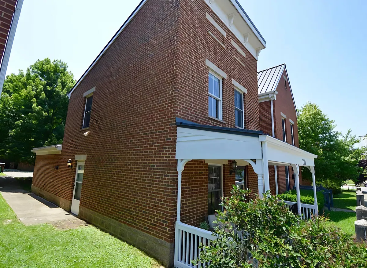 Side of house including side entrance - 230 W 8th St