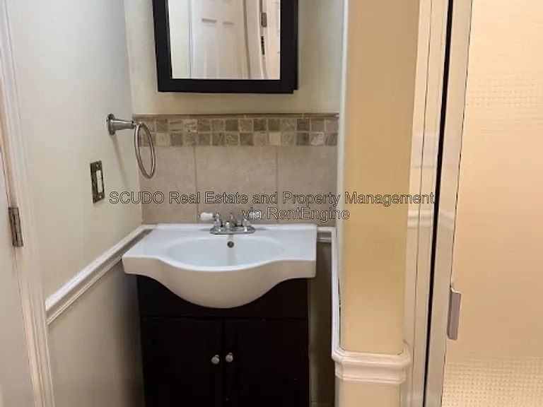 418 E 63rd Ter — Photo 14