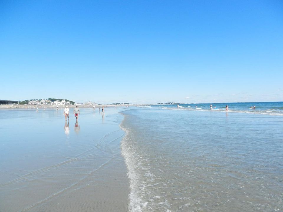 Nantasket Beach at low tide. Three miles of sandy beach... g