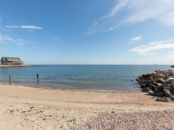 The Seller of 131 Neck Rd has a 1/3 interest in a piece of private beach property which is also being sold with the house. (This view is looking east.) This piece of beach is approximately 80 feet from the property line for 131 Neck Rd.