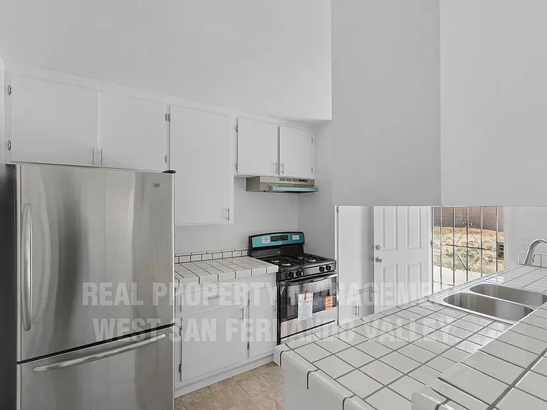 7749 Kentland Ave — Photo 13