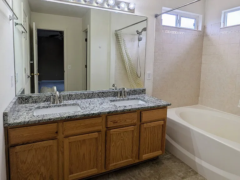 Master bathroom--with granite and tile floor! Oversized bathtub