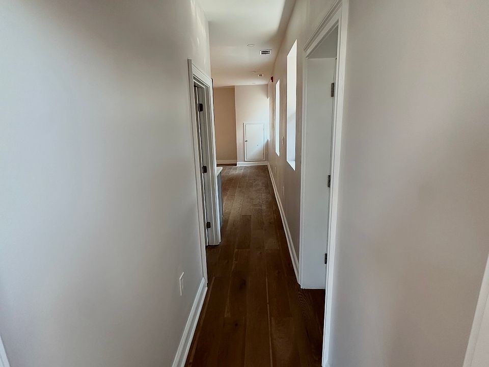 hallway from "bedroom 3" to the "kitchen/living" room