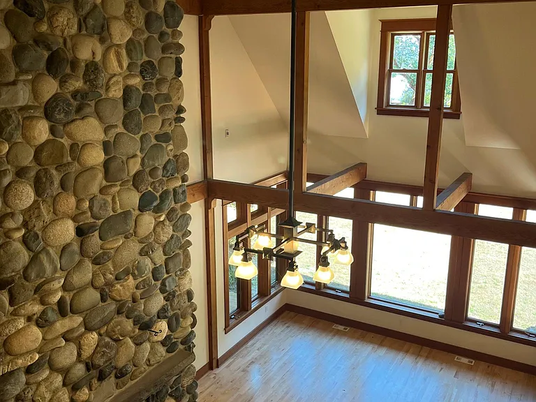 Living room has soaring ceilings.