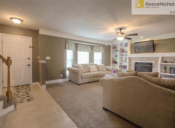 The tile entry greets you as you enter the home and carries thru into the entire kitchen/laundry/half bath areas.  The Family Room is very large and offers plenty of room for seating.