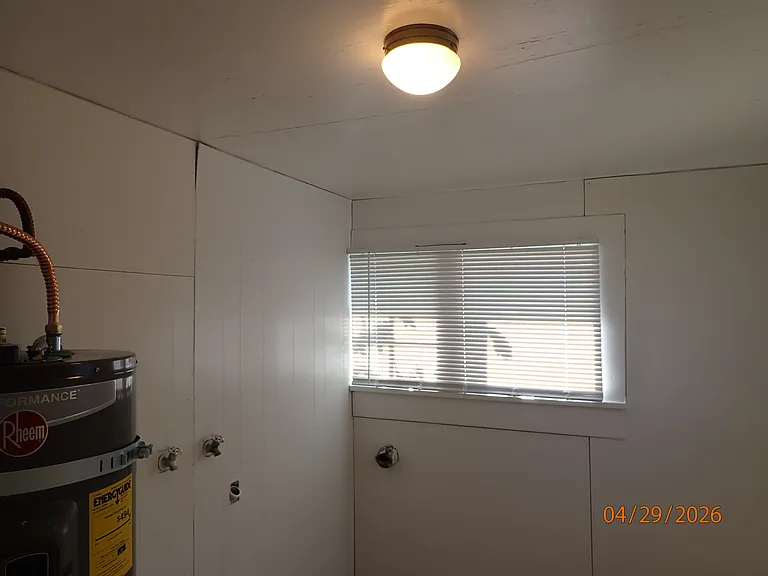 laundry room, new hot water heater