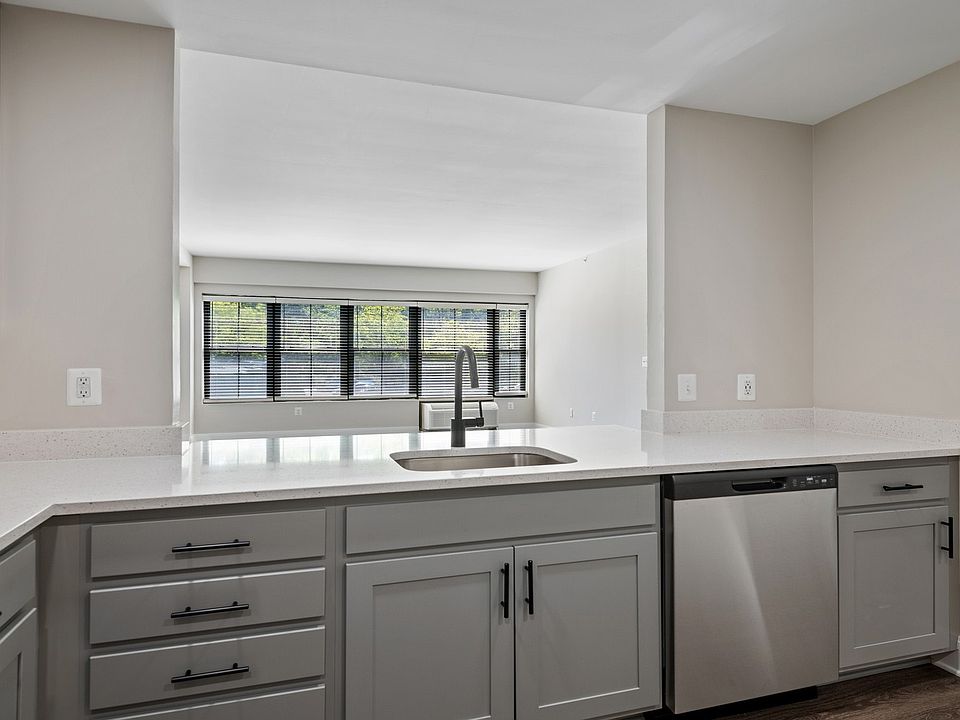 Select homes feature upgraded kitchens with quartz countertops and wood flooring