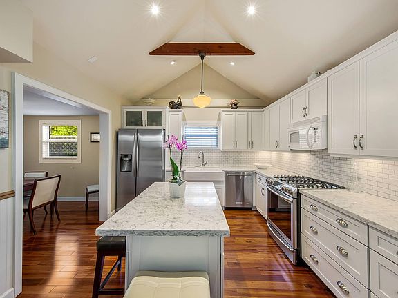 remodeled kitchen with island. 
All appliances stay included all cooking ware and utensils included during term of rent