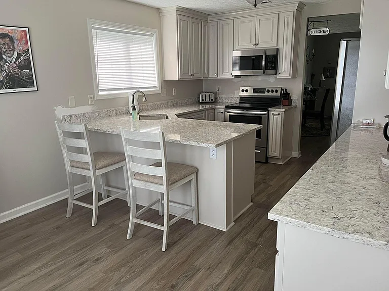 Recent full kitchen renovation with stainless steel appliances