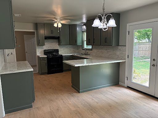 Kitchen, Breakfast Room, & Door to Backyard