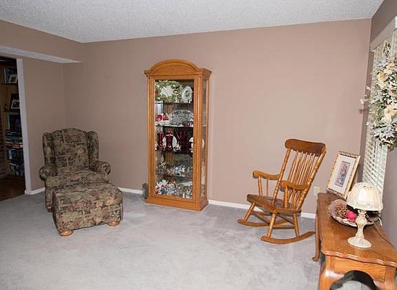 Formal living room to the right of the entry of the home