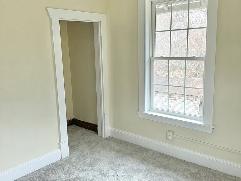 Bedroom 2. Newly installed carpets
