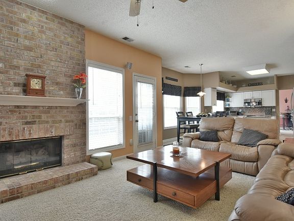 great room opens to kitchen