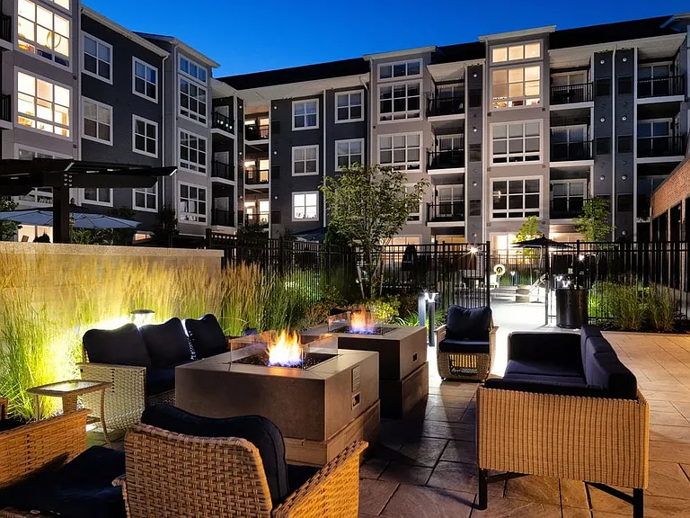 Courtyard with fireplace and lounge seating