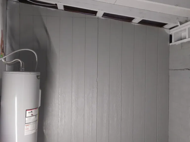 Back laundry room /storage room / new water heater