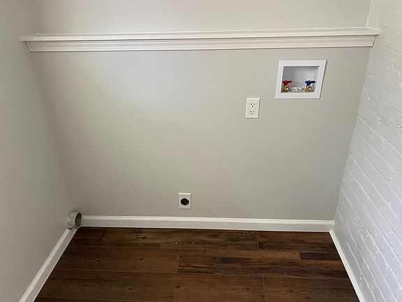 Laundry hook up upstairs in one unit, the rest are basement hookups. Electric.
