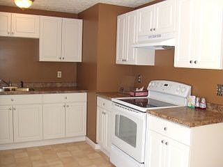 New Custom kitchen cabinets and new stove, dishwasher, and refrigerator!