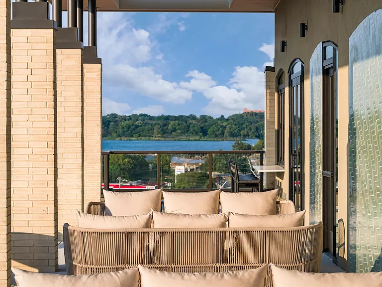 Unwind with stunning views of White Rock Lake from Modera Trailhead's inviting terrace, where nature and city living meet.