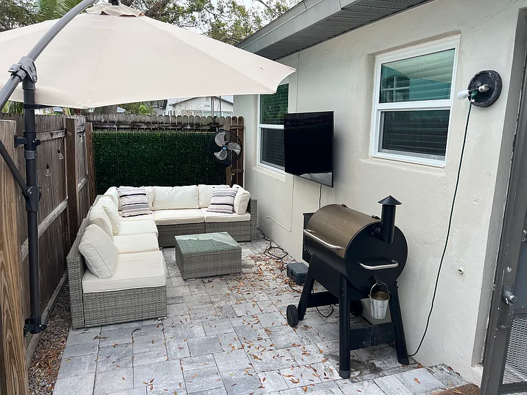 Furnishings are tenants and can give you an idea of what you can do with back patio. Patio is outside of kitchen door.