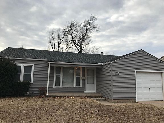 Front view new siding added to home