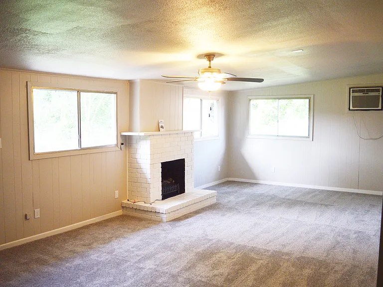 Newly carpeted family room. Approximately 13' x 27'.