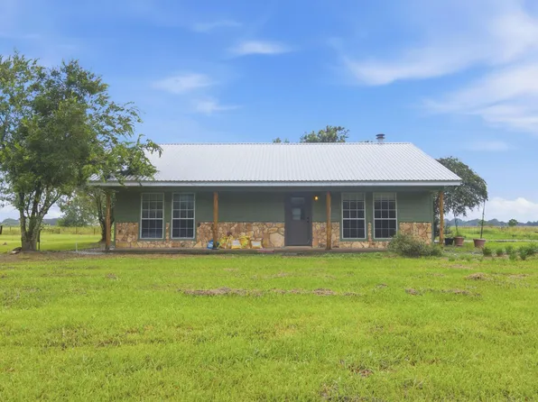 12135 Pousson Rd, Iowa, LA 70647
