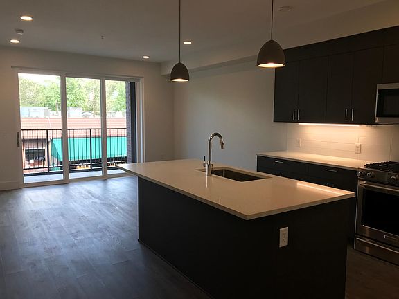 Spacious, open concept design for kitchen and living room area